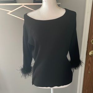 Black long sleeve Sweater with feather ends at the sleeves Size Large